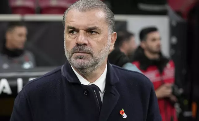 Tottenham's head coach Ange Postecoglou watches during the Europa League opening phase soccer match between Galatasaray and Tottenham Hotspur at Ali Sami Yen stadium, in Istanbul, Turkey, Thursday, Nov. 7, 2024. (AP Photo/Khalil Hamra)