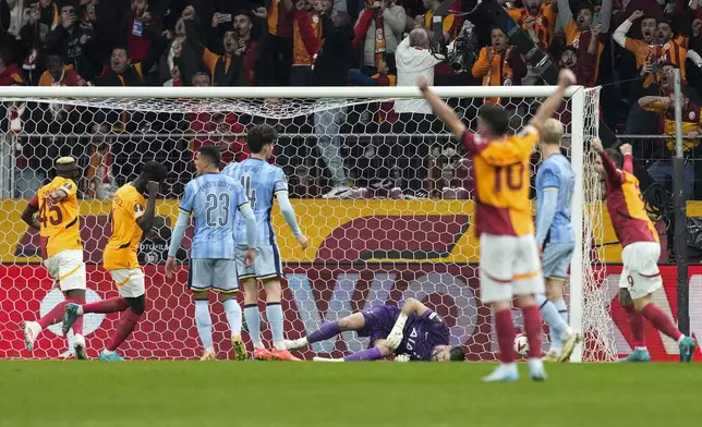 Galatasaray's Yunus Akgun , not seen in the picture scores his side's first goal during the Europa League opening phase soccer match between Galatasaray and Tottenham Hotspur at Ali Sami Yen stadium, in Istanbul, Turkey, Thursday, Nov. 7, 2024. (AP Photo/Khalil Hamra)