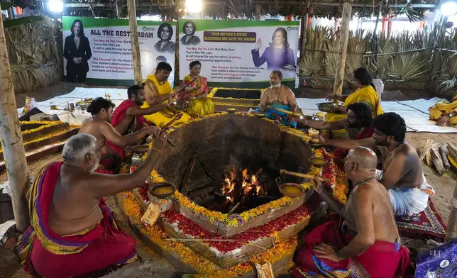 Hindu priests perform rituals during special prayers for the victory of Democratic presidential nominee Vice President Kamala Harris in the U.S. elections at Palvancha, Telangana, India, Monday, Nov. 4, 2024. The prayers were organized by an educational foundation named after Harris' late mother Shyamala Gopalan. (AP Photo/Mahesh Kumar A.)