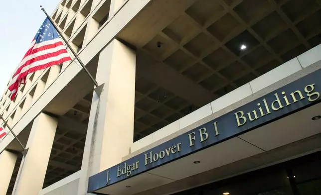 FILE - The FBI's J. Edgar Hoover headquarters building is seen in Washington on Nov. 2, 2016. (AP Photo/Cliff Owen, File)