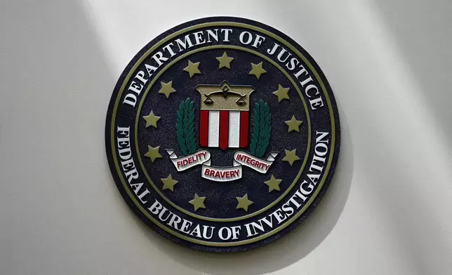 FILE - The FBI seal is pictured in Omaha, Neb., Aug. 10, 2022. (AP Photo/Charlie Neibergall, File)