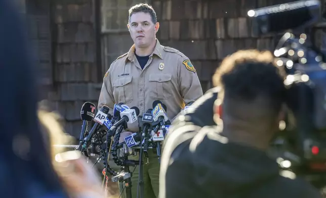 Assistant Division Fire Warden Chris Franek speaks to reporters during a briefing at the New Jersey Forest Fire Service Command Post, Monday, Nov. 11, 2024, in Ringwood, N.J. (AP Photo/Stefan Jeremiah)