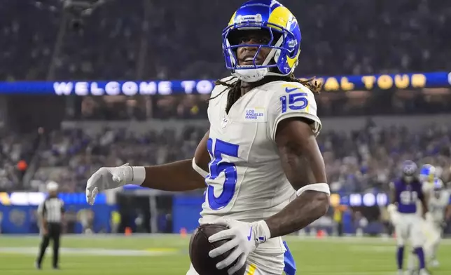 Los Angeles Rams wide receiver Demarcus Robinson celebrates after catching a touchdown pass during the second half of an NFL football game against the Minnesota Vikings, Thursday, Oct. 24, 2024, in Inglewood, Calif. (AP Photo/Mark J. Terrill)