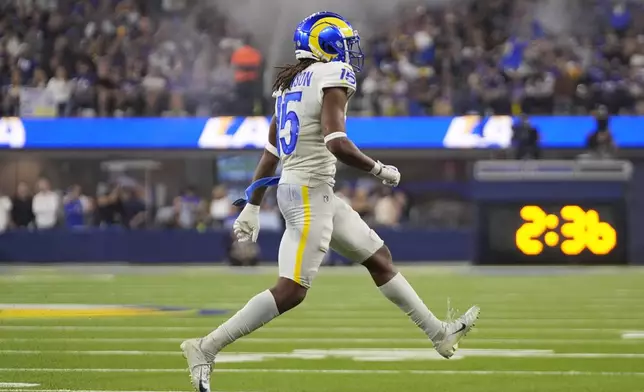 Los Angeles Rams wide receiver Demarcus Robinson (15) celebrates after scoring a 25-yard touchdown during the second half of an NFL football game against the Minnesota Vikings, Thursday, Oct. 24, 2024, in Inglewood, Calif. (AP Photo/Mark J. Terrill)