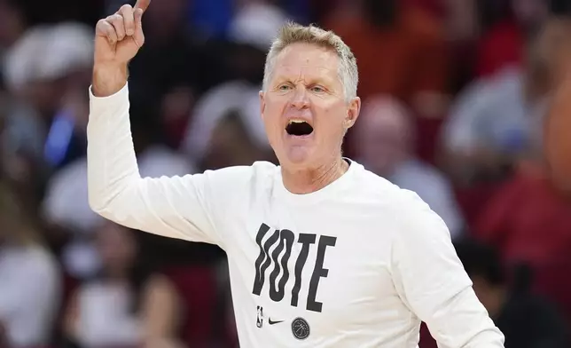 Golden State Warriors head coach Steve Kerr yells from the sideline during the first half of an NBA basketball game against the Houston Rockets, Saturday Nov. 2, 2024, in Houston. (AP Photo/Eric Christian Smith)