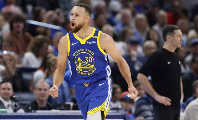 Golden State Warriors guard Stephen Curry celebrates after a 3-pointer during the first half of an NBA basketball game against the Oklahoma City Thunder, Sunday, Nov. 10, 2024, in Oklahoma City. (AP Photo/Nate Billings)