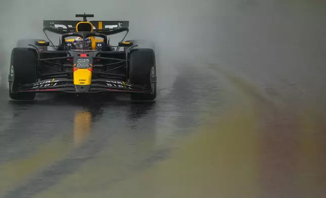 Max Verstappen, of Netherlands, steers his Red Bull during the Brazilian Formula One Grand Prix at the Interlagos race track in Sao Paulo, Sunday, Nov. 3, 2024. (AP Photo/Andre Penner)