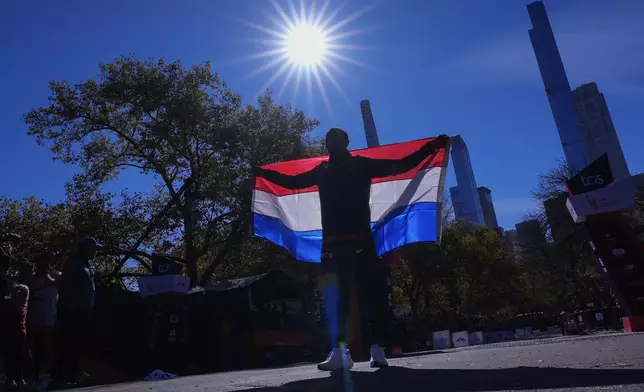 Abdi Nageeye, of the Netherlands, poses after winning the men's division of the New York City Marathon, Sunday, Nov. 3, 2024, in New York. (AP Photo/Frank Franklin II)