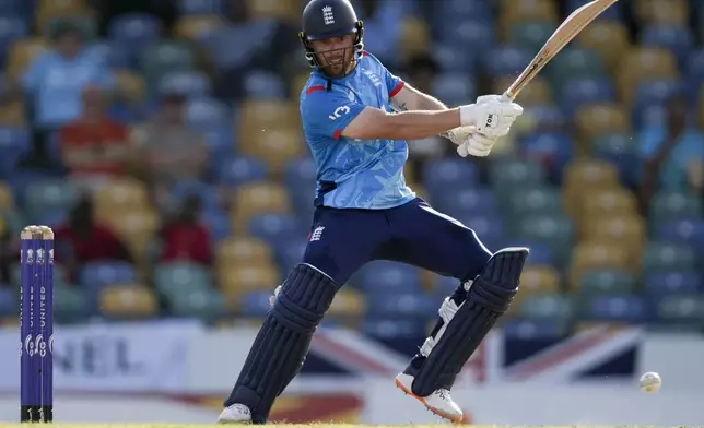 England's Phil Salt plays a shot against West Indies during the third ODI cricket match at Kensington Oval in Bridgetown, Barbados, Wednesday, Nov. 6, 2024. (AP Photo/Ricardo Mazalan)