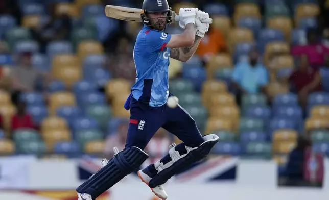 England's Phil Salt plays a shot against West Indies during the third ODI cricket match at Kensington Oval in Bridgetown, Barbados, Wednesday, Nov. 6, 2024. (AP Photo/Ricardo Mazalan)