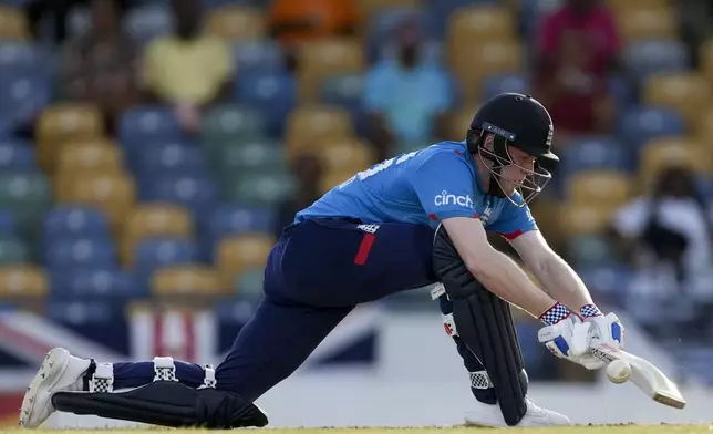 England's Dan Mousley plays a shot against West Indies during the third ODI cricket match at Kensington Oval in Bridgetown, Barbados, Wednesday, Nov. 6, 2024. (AP Photo/Ricardo Mazalan)