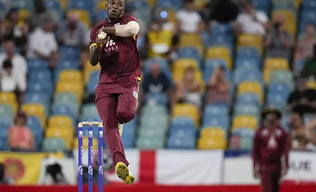 West Indies' Matthew Forde bowls against England during the third ODI cricket match at Kensington Oval in Bridgetown, Barbados, Wednesday, Nov. 6, 2024. (AP Photo/Ricardo Mazalan)