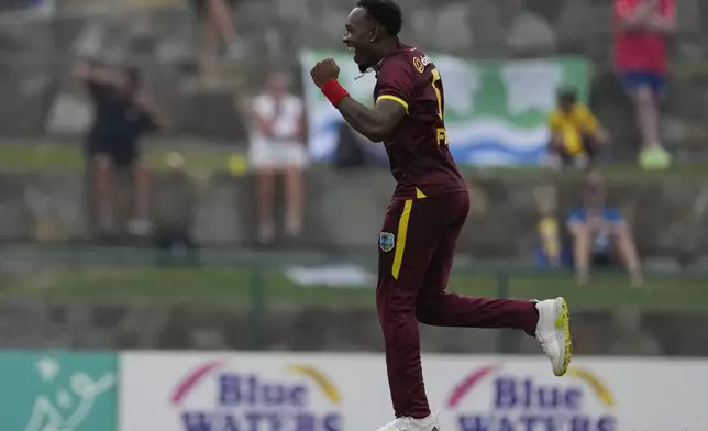 West Indies' Matthew Forde celebrates dismissing England's Sam Curran during the first ODI cricket match at Sir Vivian Richards Ground in North Sound, Antigua and Barbuda, Thursday, Oct. 31, 2024. (AP Photo/Ricardo Mazalan)