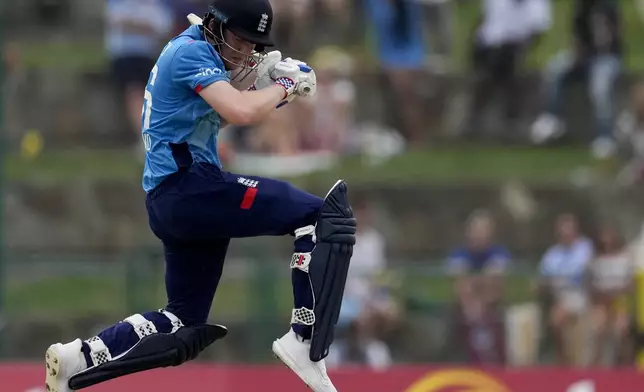 England's Dan Mousley avoids a delivery from West Indies' Jayden Seales during the first ODI cricket match at Sir Vivian Richards Ground in North Sound, Antigua and Barbuda, Thursday, Oct. 31, 2024. (AP Photo/Ricardo Mazalan)