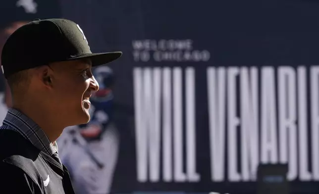 Chicago White Sox's new manager Will Venable poses for a portrait after the baseball team's news conference Friday, Nov. 8, 2024, in Chicago. (AP Photo/Charles Rex Arbogast)