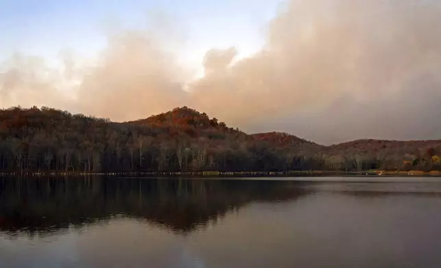 This image provided by New Jersey Department of Environmental Protection shows the wildfire in Jennings Creek, N.J., Saturday, Nov. 9, 2024. (New Jersey Department of Environmental Protection via AP)