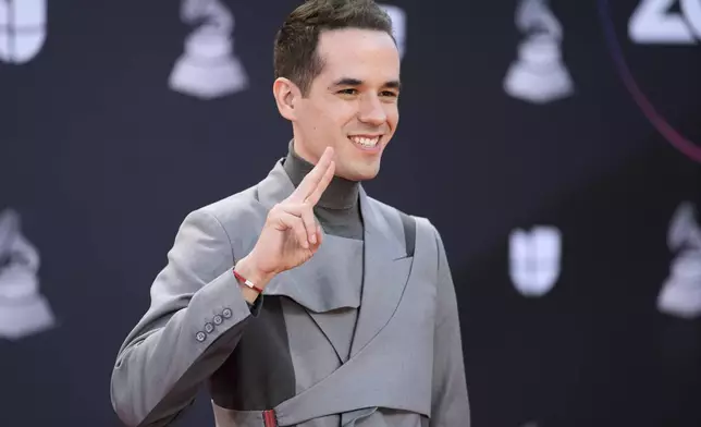 FILE - Producer and songwriter Edgar Barrera arrives at the 23rd Annual Latin Grammy Awards at the Mandalay Bay Michelob Ultra Arena in Las Vegas, Nov. 17, 2022. (AP Photo/John Locher, File)