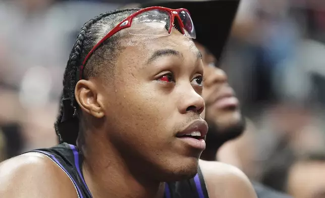 Toronto Raptors' Scottie Barnes sits on the bench during first half NBA basketball game action against the Minnesota Timberwolves in Toronto, Thursday, Nov. 21, 2024. (Frank Gunn/The Canadian Press via AP)