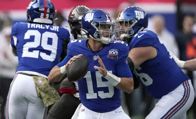 New York Giants quarterback Tommy DeVito (15) throws a pass against the Tampa Bay Buccaneers during the first half of an NFL football game Sunday, Nov. 24, 2024, in East Rutherford, N.J. (AP Photo/Seth Wenig)