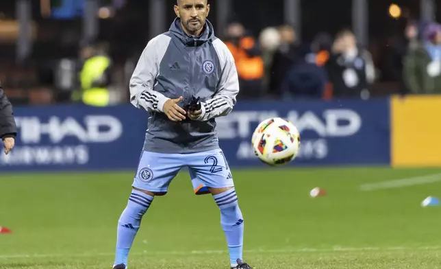 New York City FC midfielder Maxi Moralez warms up before a MLS Cup semifinal soccer match against New York Red Bulls, Saturday, Nov. 23, 2024, in New York (AP Photo/Eduardo Munoz Alvarez)