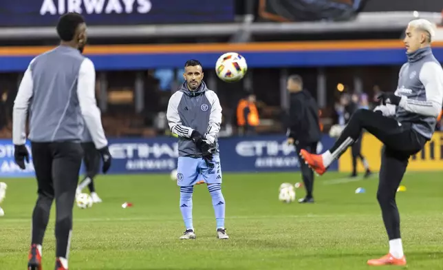 New York City FC players warm up before an MLS Cup semifinal soccer match against New York Red Bulls, Saturday, Nov. 23, 2024, in New York. (AP Photo/Eduardo Munoz Alvarez)