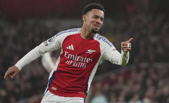 Arsenal's Ethan Nwaneri celebrates after scoring his side's third goal during the English Premier League soccer match between Arsenal and Nottingham Forest at Emirates Stadium in London, Saturday, Nov. 23, 2024. (AP Photo/Kin Cheung)