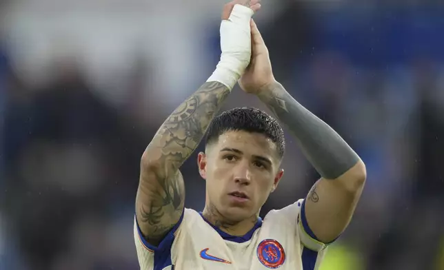 Chelsea's Enzo Fernandez reacts at the end of the English Premier League soccer match between Leicester City and Chelsea at King Power stadium in Leicester, England, Saturday, Nov. 23, 2024. (AP Photo/Dave Shopland)