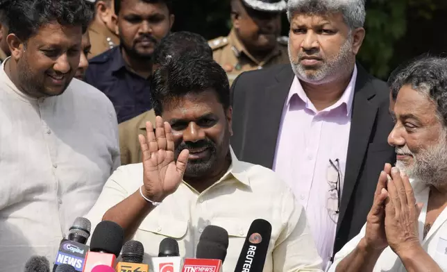 Sri Lankan President Anura Kumara Dissanayake leaves after casting his vote during the parliamentary election in Colombo, Sri Lanka, Thursday, Nov. 14, 2024.(AP Photo/Eranga Jayawardena)