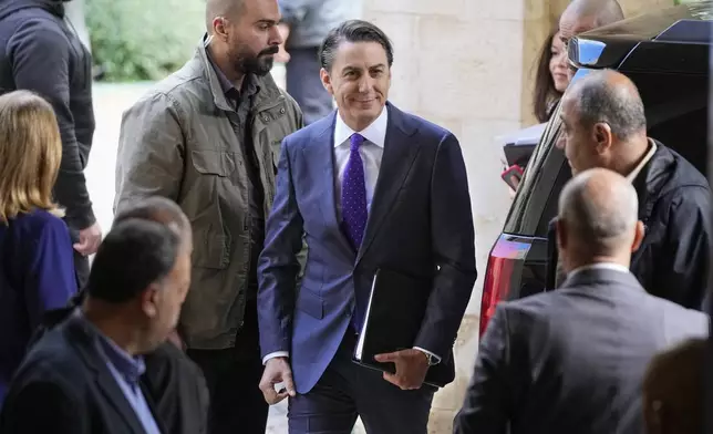 Amos Hochstein, center, a senior adviser to President Joe Biden, is received ahead of a meeting with Lebanese Parliament speaker Nabih Berri, in Beirut, Lebanon, Tuesday, Nov. 19, 2024. (AP Photo/Hassan Ammar)