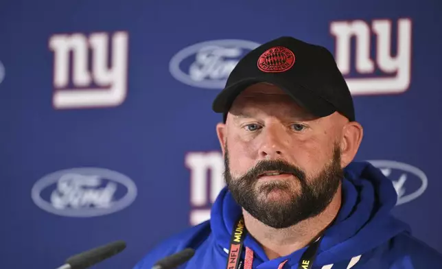 New York Giants head coach Brian Daboll attends a news conference in Munich, Germany, Friday, Nov. 8, 2024. The New York Giants are set to play the Carolina Panthers in an NFL game at the Allianz Arena in Munich on Sunday. (AP Photo/Lennart Preiss)