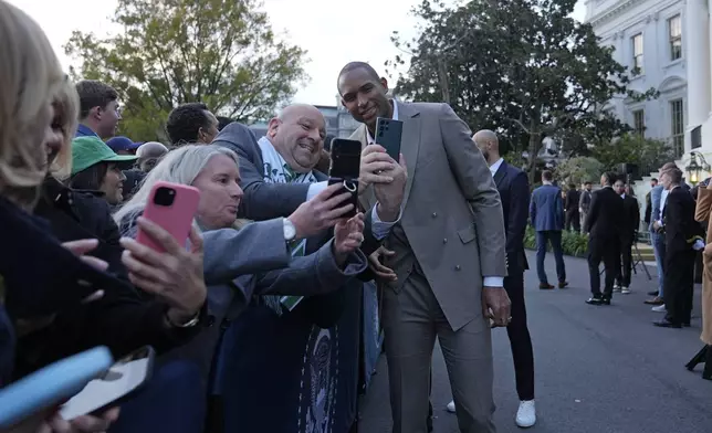 Boston Celtics Al Horford, center, poses with guests during an event with President Joe Biden to celebrate the Celtics victory in the 2024 National Basketball Association Championship, on the South Lawn of the White House in Washington, Thursday, Nov. 21, 2024. (AP Photo/Susan Walsh)