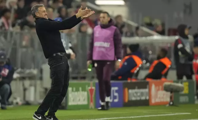 PSG's head coach Luis Enrique reacts during the Champions League opening phase soccer match between FC Bayern and Paris Saint Germain, at the Allianz Arena in Munich, Germany, Tuesday, Nov. 26, 2024.(AP Photo/Matthias Schrader)