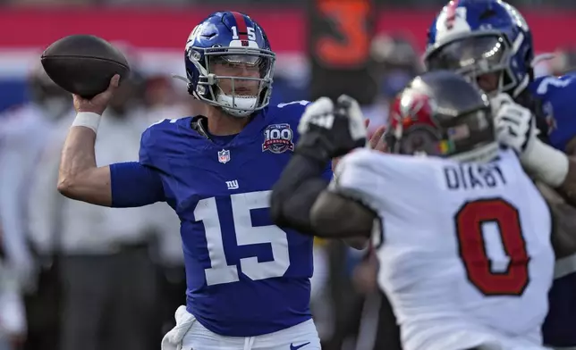 New York Giants quarterback Tommy DeVito (15) throws a pass against the Tampa Bay Buccaneers during the first half of an NFL football game Sunday, Nov. 24, 2024, in East Rutherford, N.J. (AP Photo/Seth Wenig)