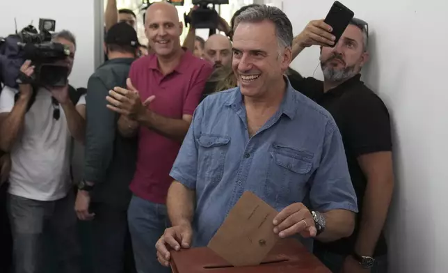 Yamandu Orsi, presidential candidate from the Frente Amplio (Broad Front), votes in the presidential run-off election in Canelones, Uruguay, Sunday, Nov. 24, 2024. (AP Photo/Matilde Campodonico)