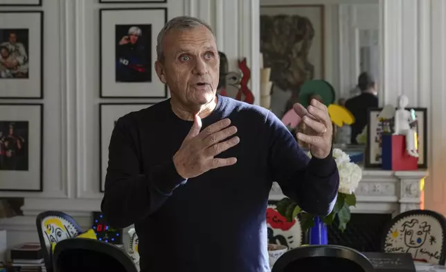 Designer Jean-Charles de Castelbajac gestures as he speaks during an interview with the Associated Press Wednesday, Nov. 20, 2024 in Paris. (AP Photo/Michel Euler)