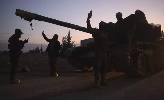 Opposition forces take control of areas outside Aleppo, Syria, Friday, Nov. 29, 2024. (AP Photo/Ghaith Alsayed)