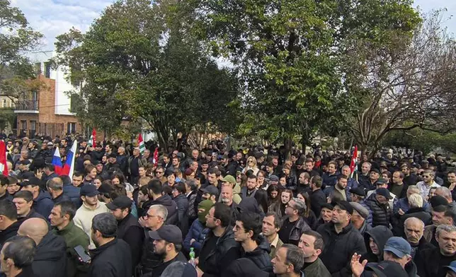 In this photo taken from video released by AIASHARA Independent Agency, Protesters gather outside the parliament building of the Georgian separatist region of Abkhazia as tensions flared over a proposed pact that would allow Russians to buy apartments in the region, Georgia, on Friday, Nov. 15, 2024. (AIASHARA Independent Agency via AP)