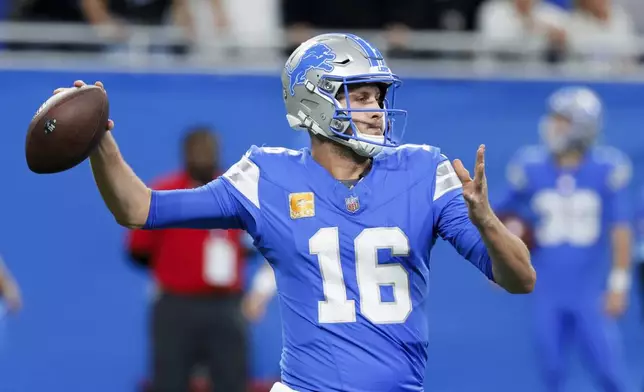 Detroit Lions quarterback Jared Goff (16) throws against the Jacksonville Jaguars during the second half of an NFL football game, Sunday, Nov. 17, 2024, in Detroit. (AP Photo/Duane Burleson)