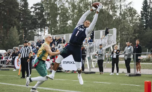 This photo provided by USA Football shows U.S. National Team flag football player Bruce Mapp playing against Brazil at the 2024 IFAF Flag Football World Championships at the Pajulahti Olympic Training Center in Lahti, Finland, Aug. 27, 2024. (Lester Barnes/USA Football via AP)