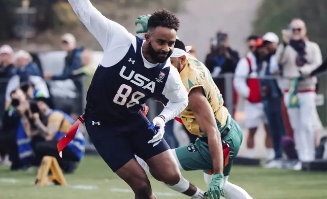 This photo provided by USA Football shows U.S. National Team flag football player Ja’Deion High playing against Brazil at the 2024 IFAF Flag Football World Championships at the Pajulahti Olympic Training Center in Lahti, Finland, Aug. 27, 2024. (Lester Barnes/USA Football via AP)