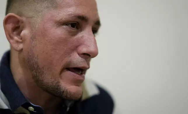 Nicaraguan Sergio Mena, who was released from a Nicaraguan jail and rendered "stateless", speaks during an interview in Guatemala City, Wednesday, Oct. 16, 2024. (AP Photo/Moises Castillo)