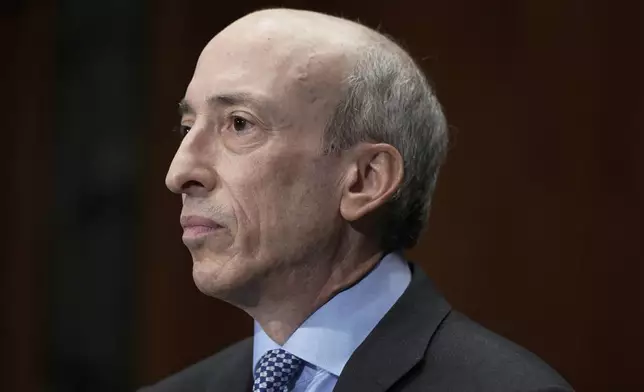 FILE - Securities and Exchange Commission Chair Gary Gensler listens during a Senate Banking Committee Hybrid hearing on 'Oversight of the U.S. Securities and Exchange Commission," on Sept. 12, 2023, on Capitol Hill in Washington. (AP Photo/Mariam Zuhaib, File)