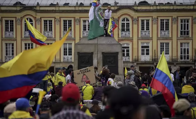 Demonstrators rally against the government of President Gustavo Petro, in Bogotá, Colombia, Saturday, Nov. 23, 2024. (AP Photo/Ivan Valencia)