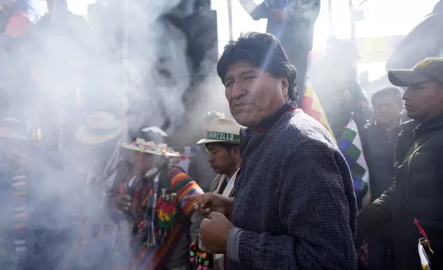 FILE - Former President Evo Morales participates in an offering to Mother Earth before leading a march to Bolivia's capital, as part of a political dispute with current President Luis Arce and to protest his handling of the economy, in Caracollo, Bolivia, Sept. 17, 2024. (AP Photo/Juan Karita, File)