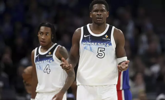 Minnesota Timberwolves guard Anthony Edwards (5) reacts to an official's call during the first half of an NBA basketball game against the Sacramento Kings, Wednesday, Nov. 27, 2024, in Minneapolis. (AP Photo/Ellen Schmidt)