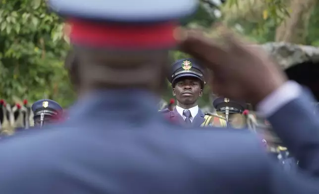 The Kenyan military guard of honour gets ready to welcome President William Ruto, before delivering the State of Nation address at the Parliament Buildings in Nairobi, Kenya Thursday, Nov. 21, 2024. (AP Photo/Brian Inganga)