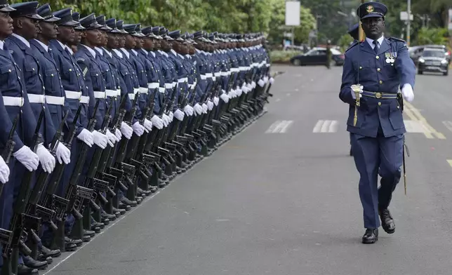 The Kenyan military guard of honour gets ready to welcome President William Ruto, before delivering the State of Nation address at the Parliament buildings in Nairobi, Kenya Thursday, Nov. 21, 2024. (AP Photo/Brian Inganga)