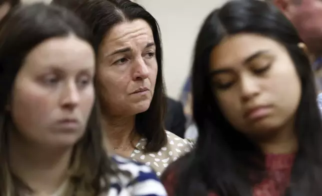 Allyson Phillips, mother of Laken Riley, second left, listens during the trial of Jose Ibarra at Athens-Clarke County Superior Court on Monday, Nov. 18, 2024, in Athens, Ga. (Miguel Martinez/Atlanta Journal-Constitution via AP, Pool)