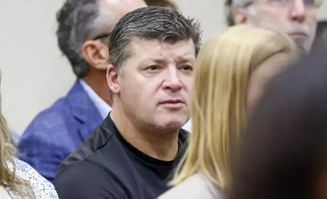 Jason Riley, center, Laken Riley's father, listens during the Jose Ibarra trial at Athens-Clarke County Superior Court on Monday, Nov. 18, 2024, in Athens, Ga. (Miguel Martinez/Atlanta Journal-Constitution via AP, Pool)