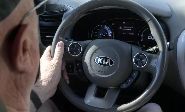 The dashboard of a Kia Soul electric vehicle is shown as Ken Honeycutt drives while interviewed in San Lorenzo, Calif., Saturday, Nov. 9, 2024. (AP Photo/Jeff Chiu)